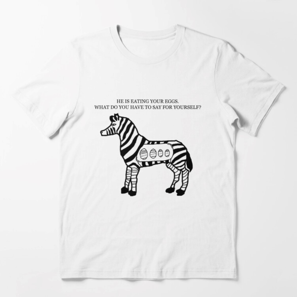 shirt displaying a badly drawn zebra full of easter eggs that says he has eaten your eggs what do you have to say for yourself